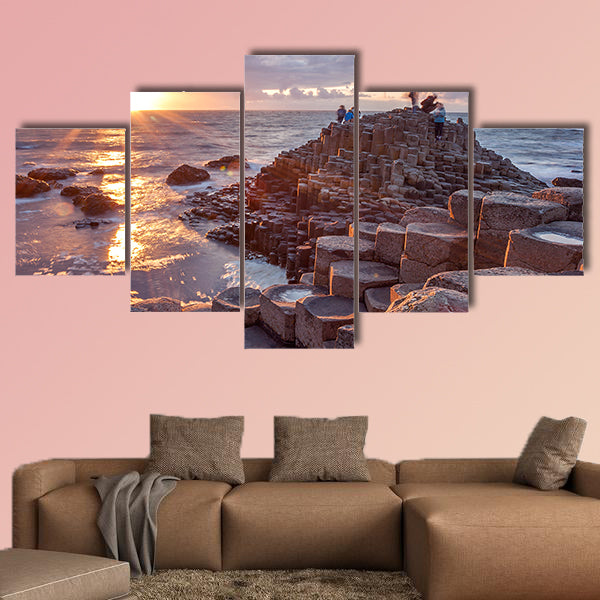 People visiting Giant s Causeway at the sunset in North Antrim, wall art