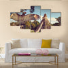 Neophron looking at the ancient ruins of the Mayan city of Tikal Central America, Guatemala Multi panel canvas wall art