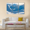 Snowy blue mountains in clouds Multi panel canvas wall art