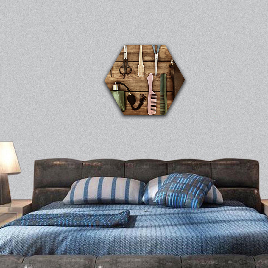 Scissors and combs on a wooden table hexagonal canvas wall art