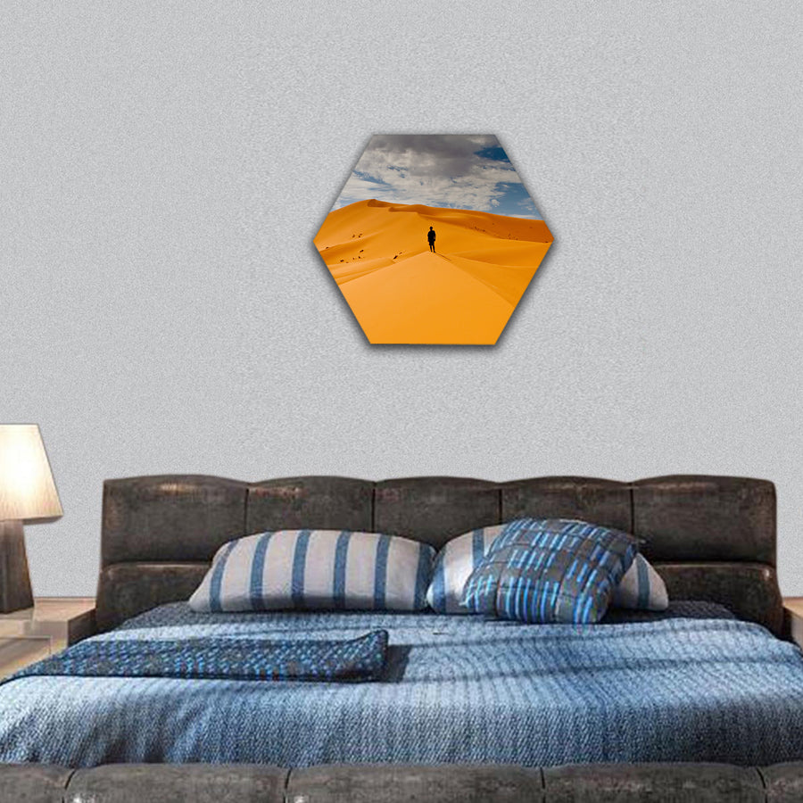 Man lost in desert dunes hexagonal canvas wall art