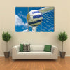 Uruguay flag and soccer ball, football in goal net Multi panel canvas wall art