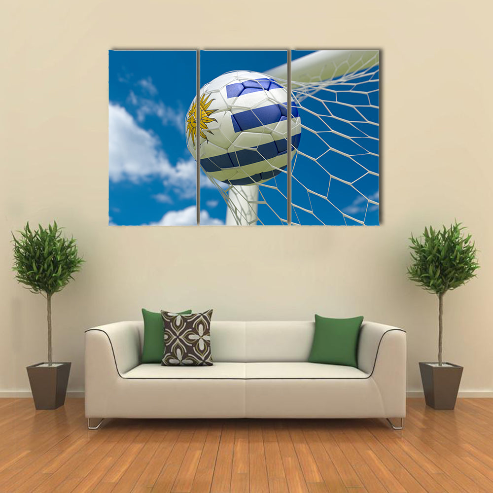 Uruguay flag and soccer ball, football in goal net Multi panel canvas wall art