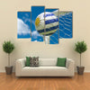 Uruguay flag and soccer ball, football in goal net Multi panel canvas wall art