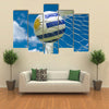 Uruguay flag and soccer ball, football in goal net Multi panel canvas wall art