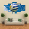 Uruguay flag and soccer ball, football in goal net Multi panel canvas wall art