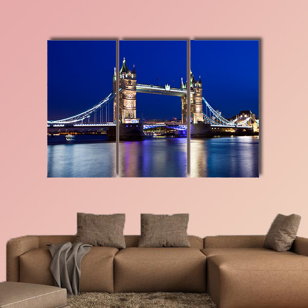 A beautiful view of Tower Bridge in London at night Multi panel canvas wall art