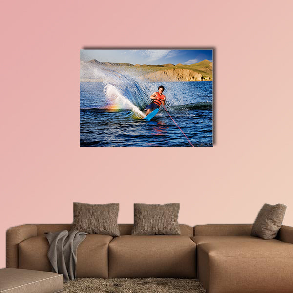 A male waterskiing on a beautiful lake Multi panel canvas wall art