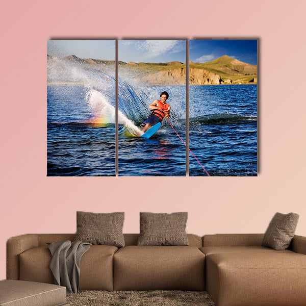 A male waterskiing on a beautiful lake Multi panel canvas wall art