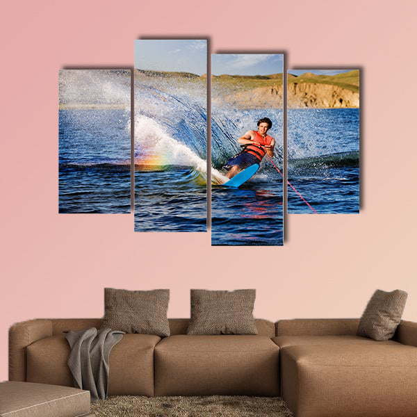 A male waterskiing on a beautiful lake Multi panel canvas wall art