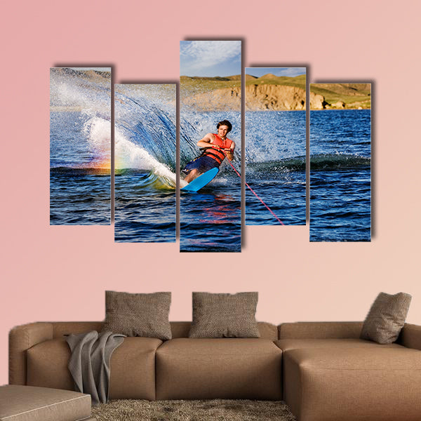 A male waterskiing on a beautiful lake Multi panel canvas wall art