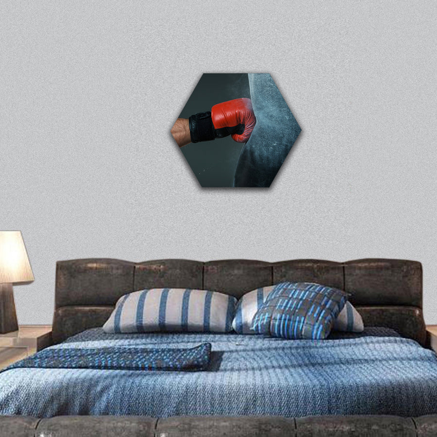 Hand of boxer and punching bag hexagonal canvas wall art