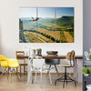 Base-jumper Jumps from the Cliff at Sunrise in the Mountains Multi Panel Canvas Wall Art