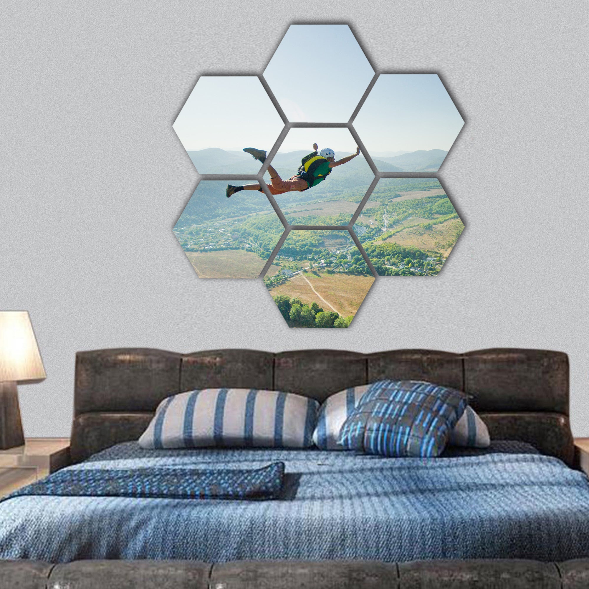 Jumper jumps from the cliff at sunrise hexagonal canvas wall art