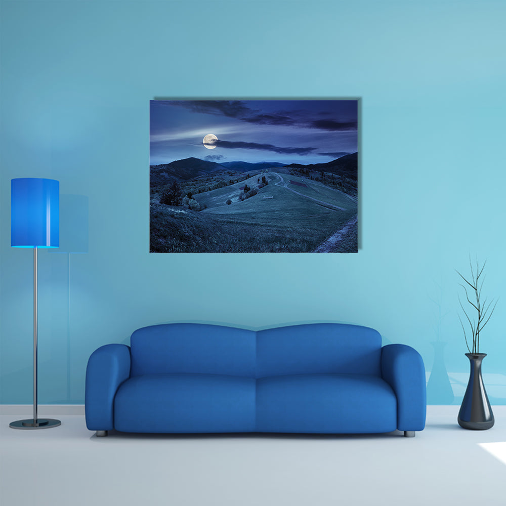 A Fence Near The Meadow Path On The Hillside And A Village Near A Forest Multi Panel Canvas Wall Art