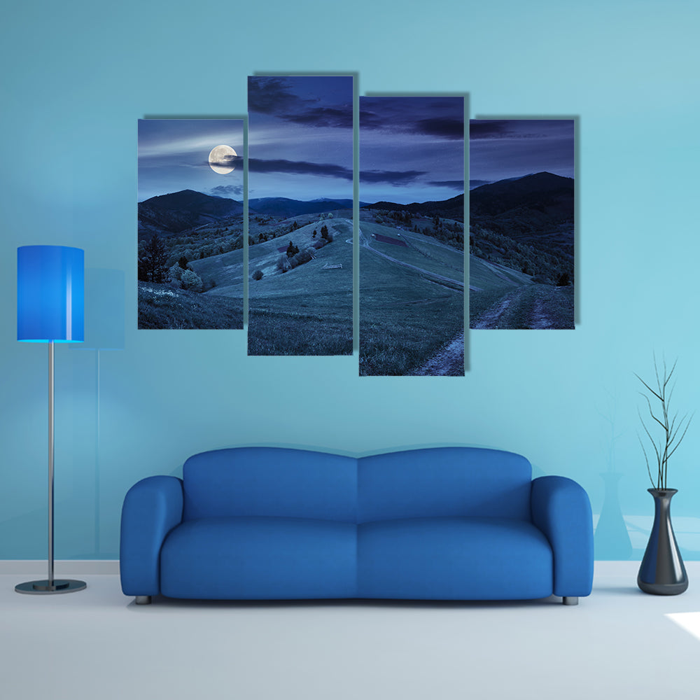 A Fence Near The Meadow Path On The Hillside And A Village Near A Forest Multi Panel Canvas Wall Art