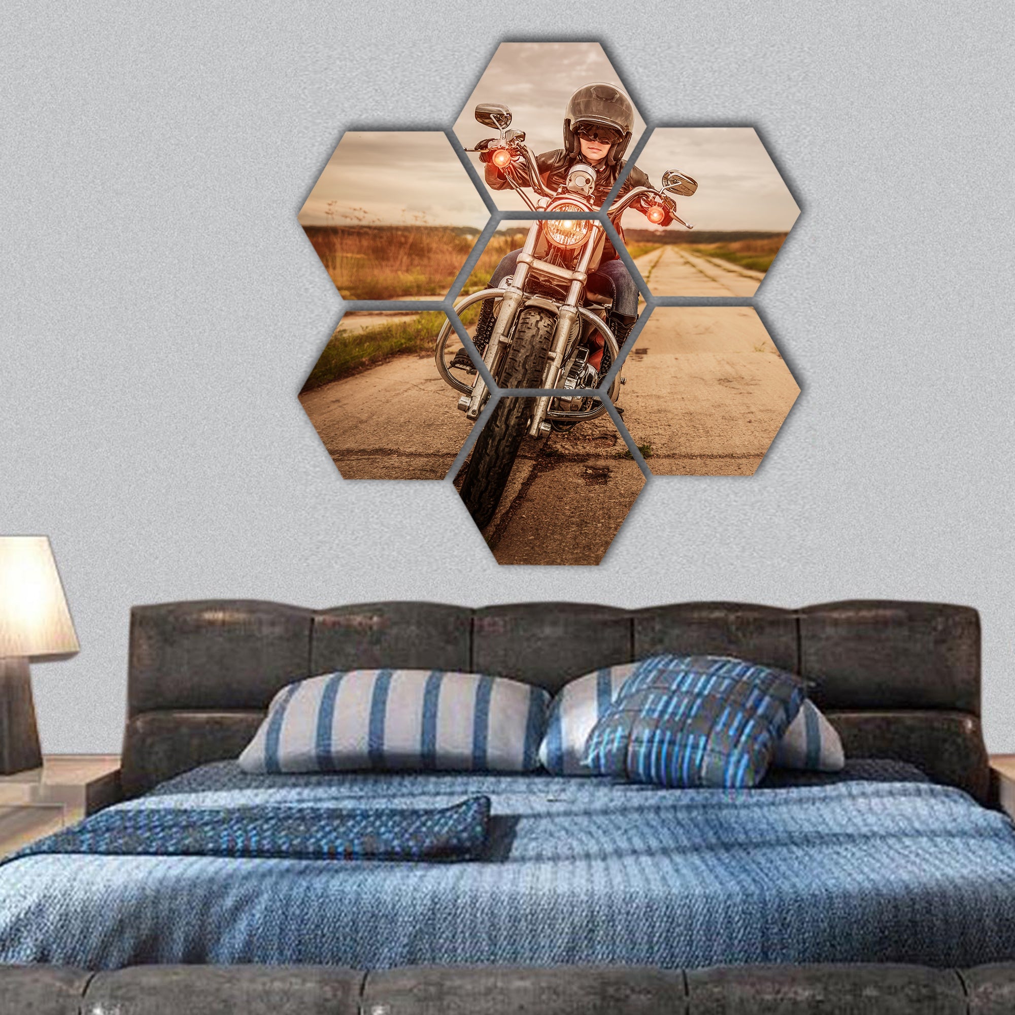 Biker girl in a leather jacket and helmet on a motorcycle hexagonal canvas wall art