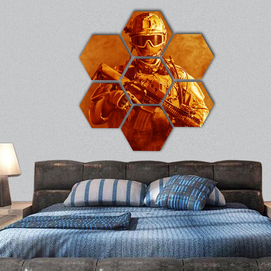 Special forces soldier with rifle in the fire hexagonal canvas wall art