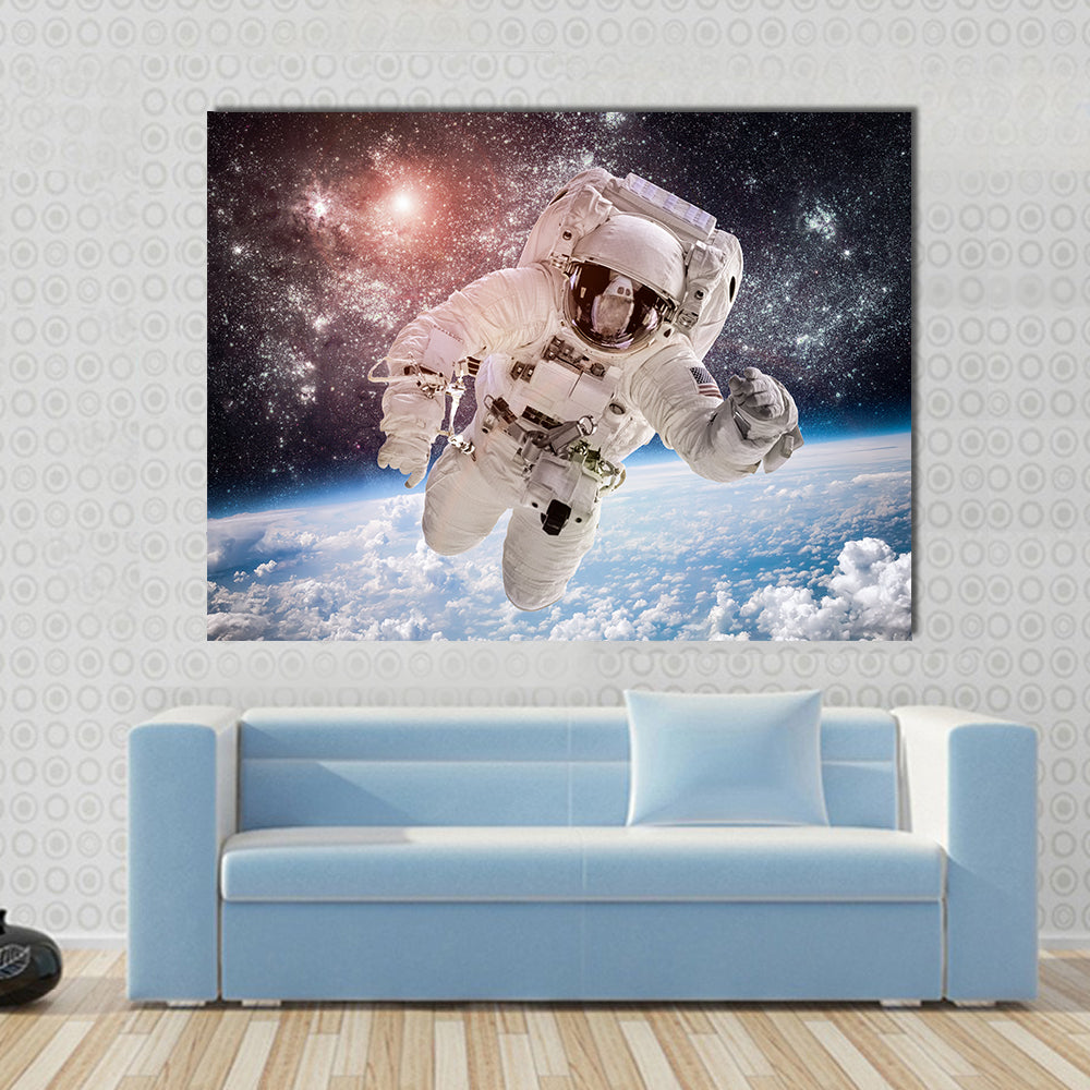 Astronaut In Snow Multi Panel Canvas Wall Art