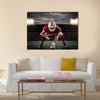 Football Player with a red uniform Multi panel canvas wall art