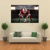 Football Player with a red uniform Multi panel canvas wall art