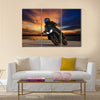 Young man riding big bike motorcycle people adventure sport leisure theme Multi panel canvas wall art