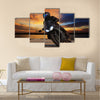 Young man riding big bike motorcycle people adventure sport leisure theme Multi panel canvas wall art