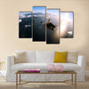 Portrait Of Two Tandem Skydivers In Action Parachuting Through The Air Multi Panel Canvas Wall Art