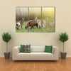 Herd of Alpine Goats Grazing on Meadow and Looking at Camera Multi Panel Canvas Wall Art