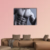 Portrait of man with muscular arms Multi panel canvas wall art