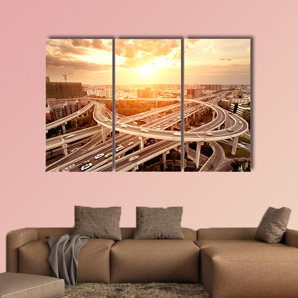 Skyline and traffic trails on highway intersection multi panel canvas wall art