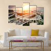 skyline and traffic trails on highway intersection multi panel canvas wall art