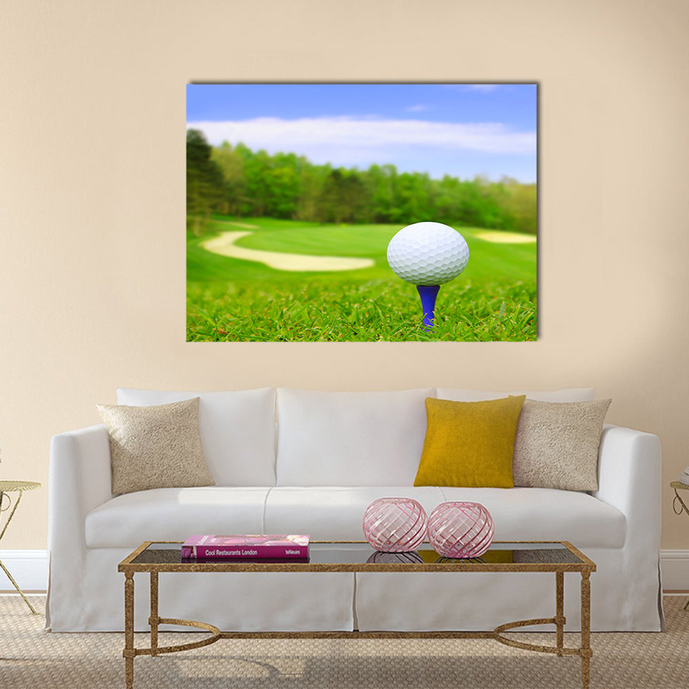 Golf ball on course with beautiful blurry landscape Multi Panel Canvas Wall Art