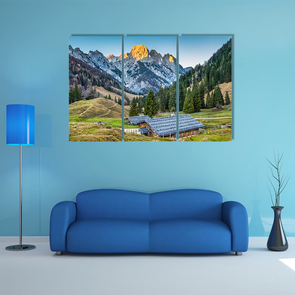 Beautiful landscape in the Alps with traditional mountain chalets multi panel canvas wall art