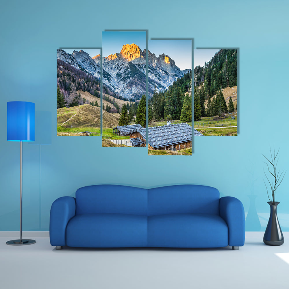 Beautiful landscape in the Alps with traditional mountain chalets multi panel canvas wall art