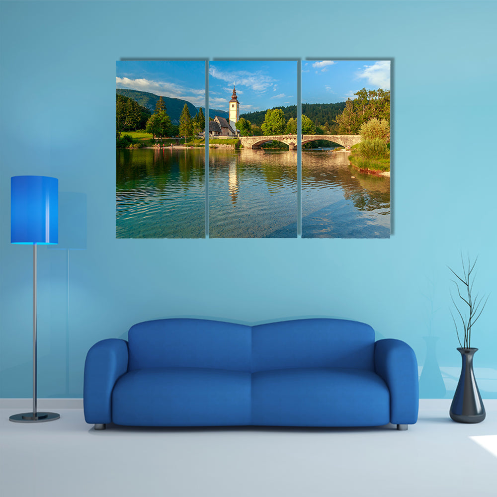 Church of Sv. John the Baptist and a bridge by the Bohinj Lake, Slovenia multi panel canvas wall art