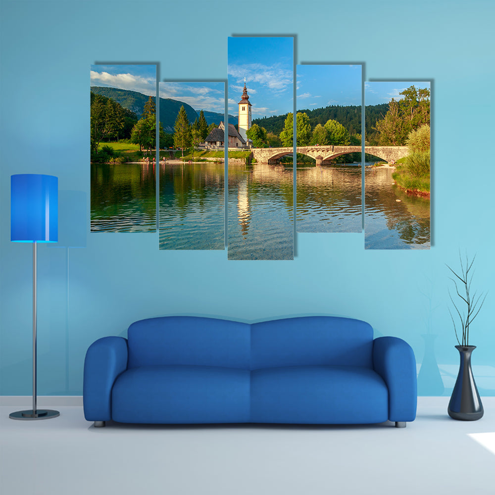 Church of Sv. John the Baptist and a bridge by the Bohinj Lake, Slovenia multi panel canvas wall art
