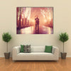 Couple with umbrella kissing at night alley multi panel canvas wall art