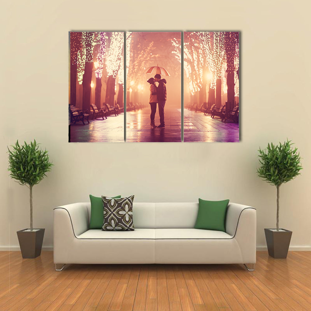 Couple with umbrella kissing at night alley multi panel canvas wall art