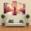 Couple with umbrella kissing at night alley multi panel canvas wall art