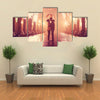 Couple with umbrella kissing at night alley multi panel canvas wall art