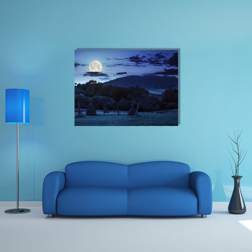 The Composite Agriculture Landscape With Stack Of Hay On A Green Meadow Near Forest Multi Panel Canvas Wall Art