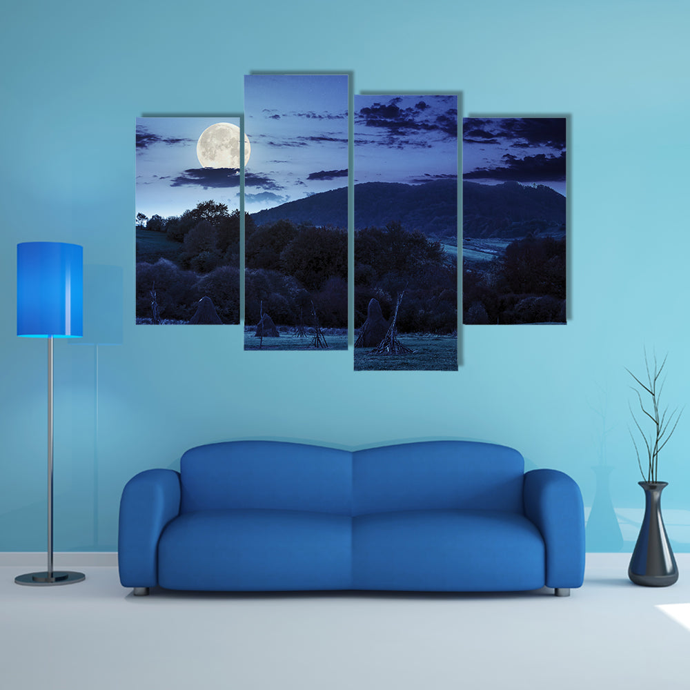 The Composite Agriculture Landscape With Stack Of Hay On A Green Meadow Near Forest Multi Panel Canvas Wall Art