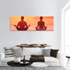 Meditation yoga couple meditating at serene beach sunset panoramic canvas wall art