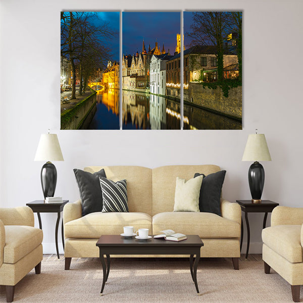 Night cityscape with a tower Belfort and Green canal Multi panel canvas wall art