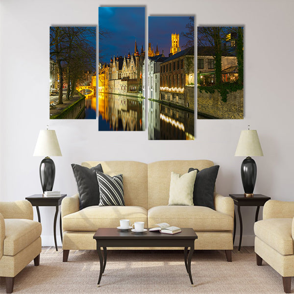 Night cityscape with a tower Belfort and Green canal Multi panel canvas wall art