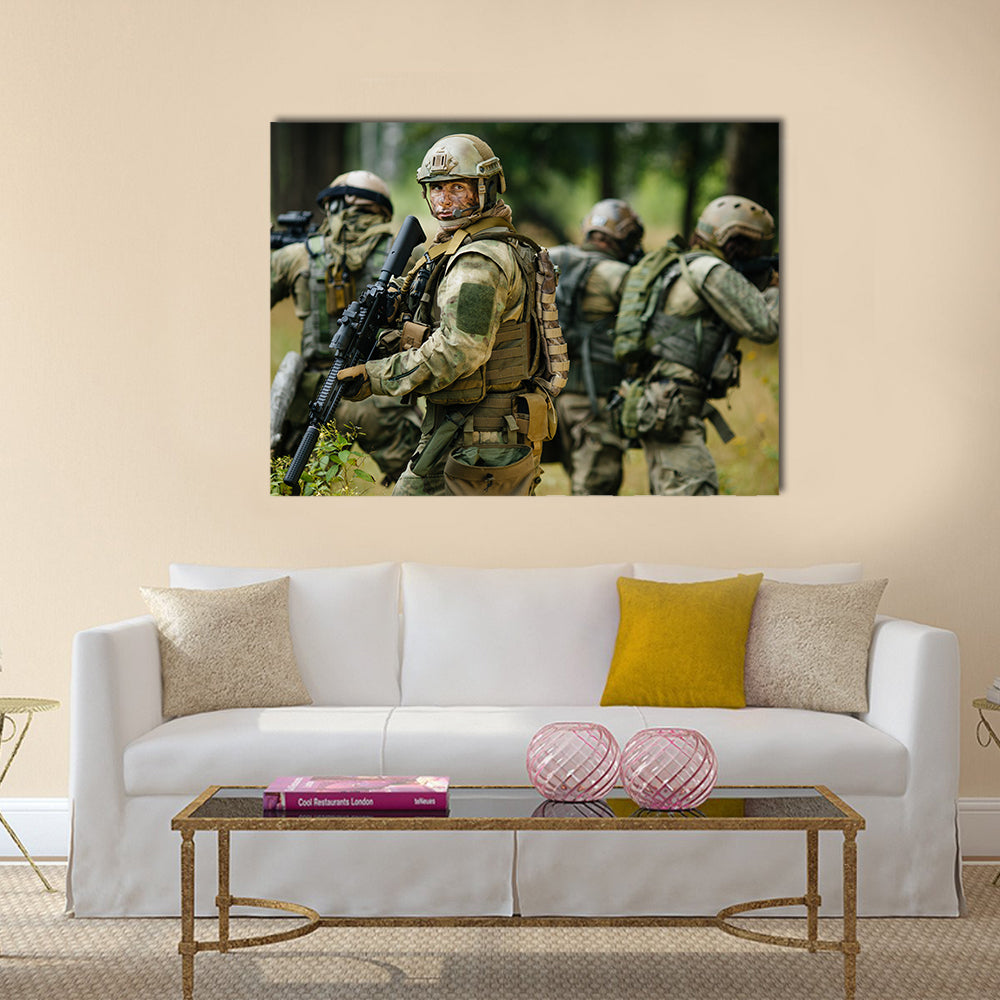 Team of soldiers engaged in the exploration of the forest Multi Panel Canvas Wall Art
