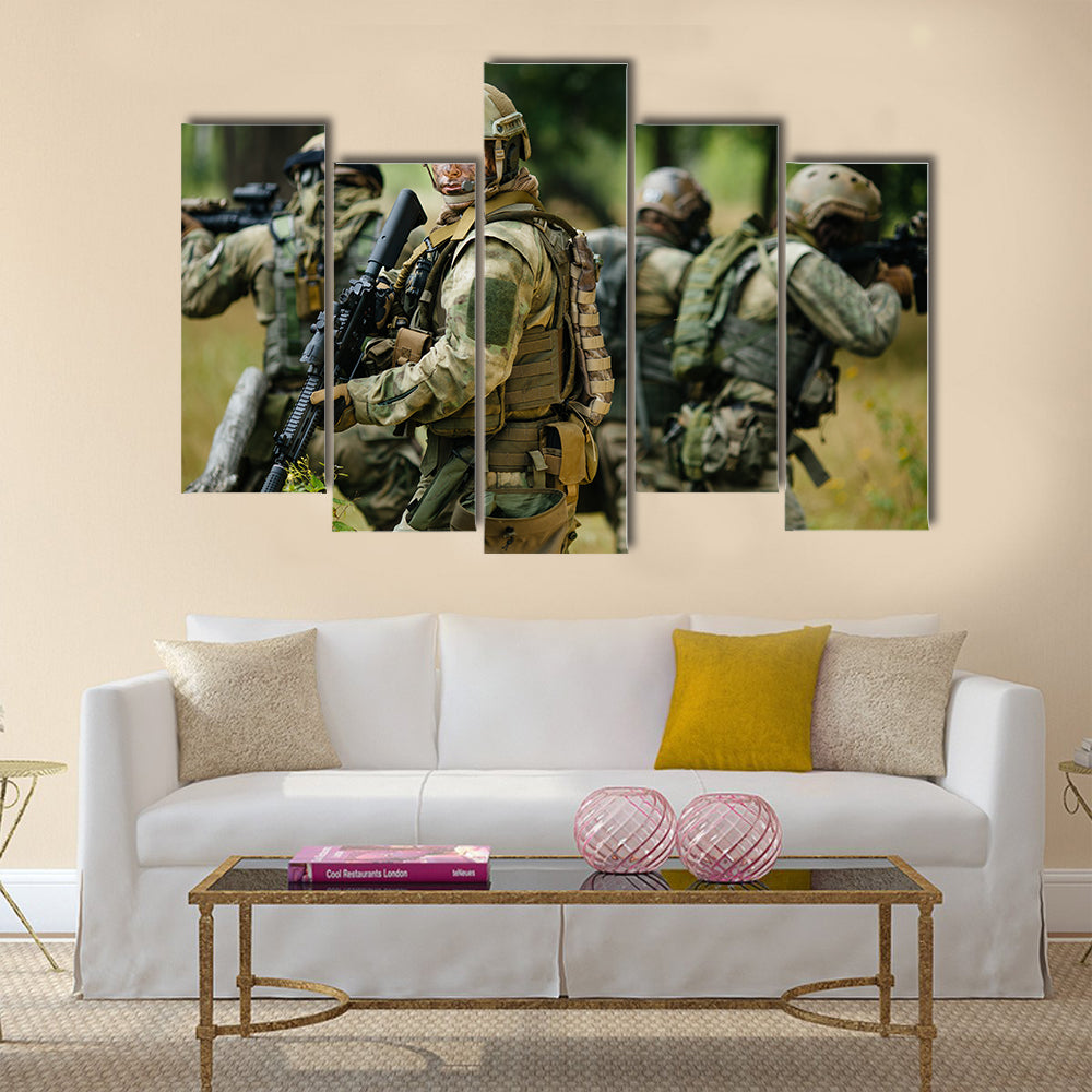 Team of soldiers engaged in the exploration of the forest Multi Panel Canvas Wall Art
