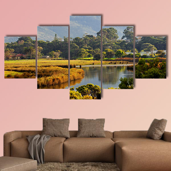 Morning sunshine on a countryside field and hills Multi panel canvas wall art