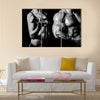 Bodybuilding, Strong man and a woman posing on a black background, Multi panel canvas wall art